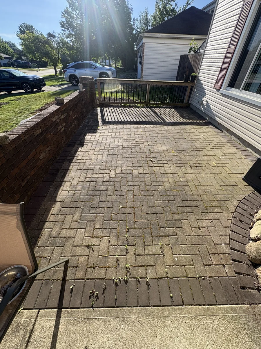 Paver patio before pressure washing